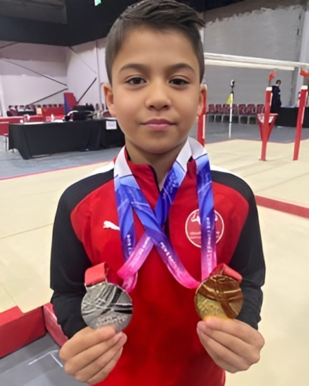 Gymnastic Gold and U12 Champion!